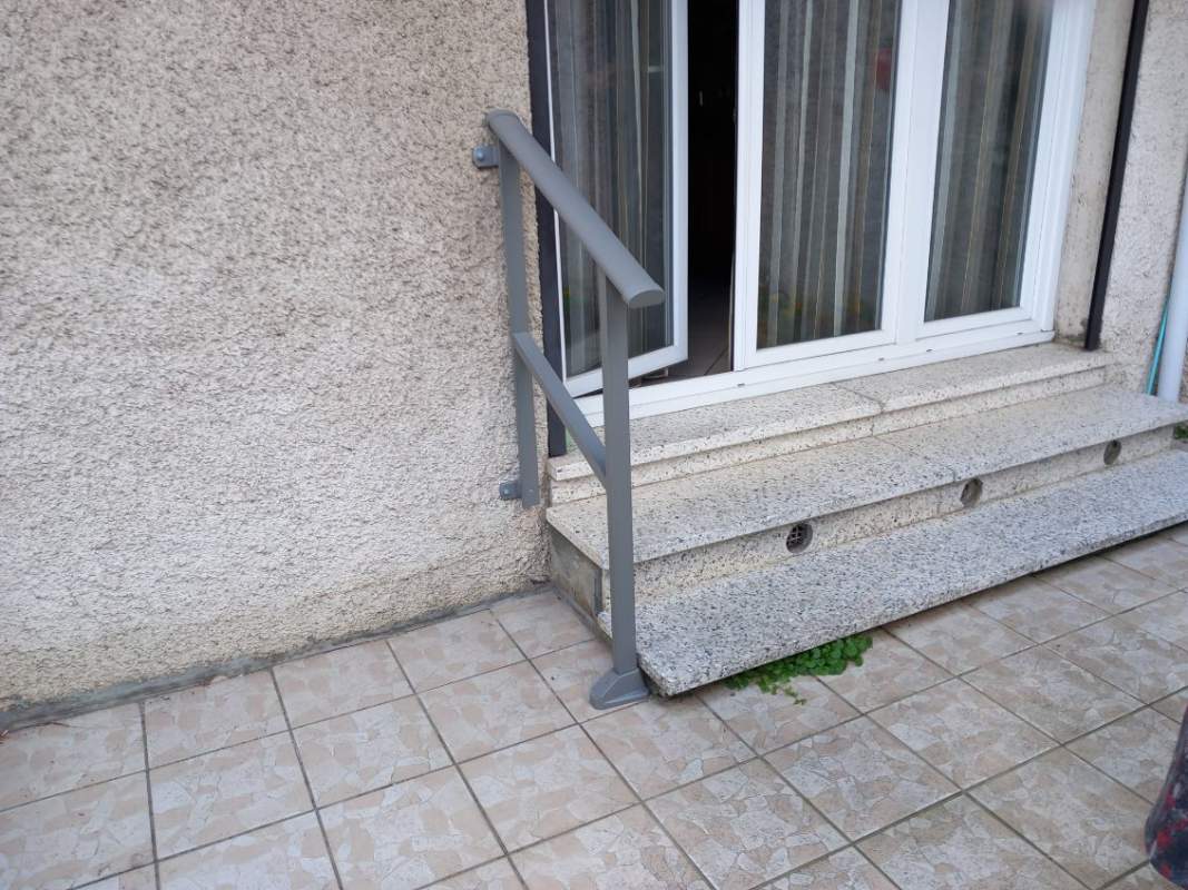 Photo de notre réalisation : AIDE À LA MONTEE