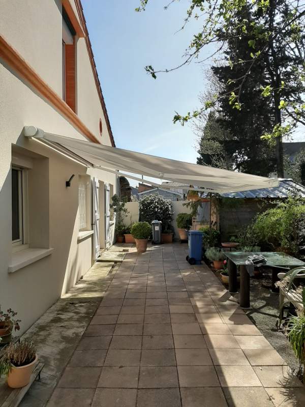 Photo de notre réalisation : STORE BANNE